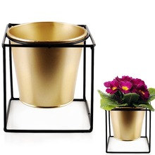 Osłonka doniczka metalowa na stojaku złota czarna na rośliny kwiat 11x11 cm